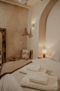 Postel nebo postele na pokoji v ubytování EntreArcos Casa Eco-Boutique + 43 fotografií