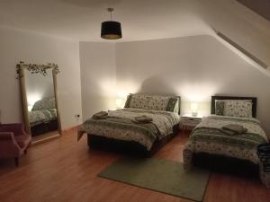 Letto o letti in una camera di Charlestown bungalow
