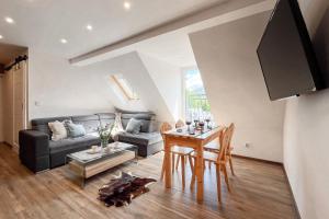 TV a/nebo společenská místnost v ubytování Apartament Krupówki w Podwórku Zakopane