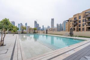 Mynd úr myndasafni af GuestReady - Lux design with top skyline view í Dúbaí