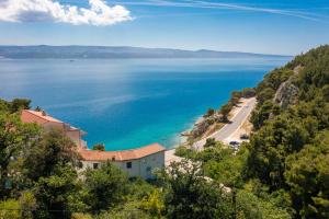 a view of the ocean from a hill at Caleta Seaview Suites II - Pool & Jacuzzi in Lokva Rogoznica +84 photos