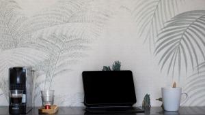 TV a/nebo společenská místnost v ubytování Maison Le Patio