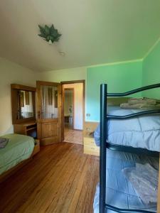 Poschodová posteľ alebo postele v izbe v ubytovaní Hotel Biancaneve