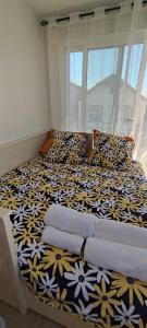 Ένα ή περισσότερα κρεβάτια σε δωμάτιο στο Maison studio duplex Mont Valérien