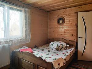 Postel nebo postele na pokoji v ubytování "У Яслигана"