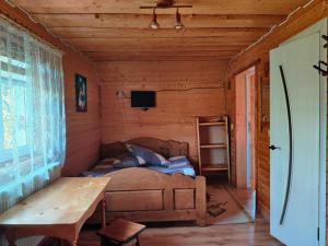 Postel nebo postele na pokoji v ubytování "У Яслигана"