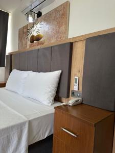 Voodi või voodid majutusasutuse Aristo 2 Butik Hotel toas