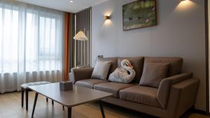 Posezení v ubytování Yun Qi Hotel