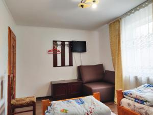 Postel nebo postele na pokoji v ubytování "У Яслигана"