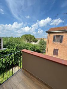 a balcony with a view of a building at Cristina's House in Ferrara