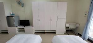 Voodi või voodid majutusasutuse Hello inn 哈囉行旅屏東館 toas