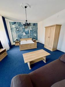 Postel nebo postele na pokoji v ubytování Hotel Růžek