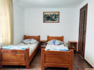 Postel nebo postele na pokoji v ubytování "У Яслигана"