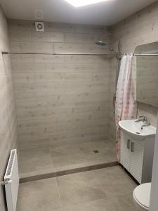 Ванная комната в VILLA ROZA Guest House