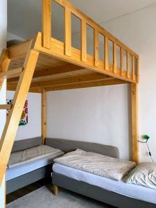Postel nebo postele na pokoji v ubytování Esztergom Central