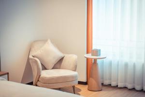 Posezení v ubytování Yun Qi Hotel