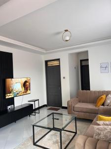 Μια τηλεόραση ή/και κέντρο ψυχαγωγίας στο Rutuha Homes 2