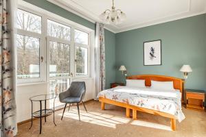 En eller flere senge i et værelse på Spa & Wellness Hotel Silva + 88 billeder