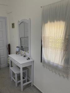 Fotografie z fotogalerie ubytování Garden Rooms v destinaci Matala + 15 fotografií