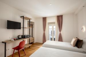 Postel nebo postele na pokoji v ubytování Hotel Ciao
