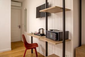 Kuchyň nebo kuchyňský kout v ubytování Hotel Ciao + 37 fotografií