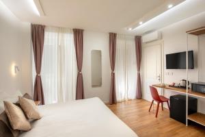 TV a/nebo společenská místnost v ubytování Hotel Ciao