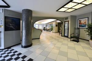 Sjónvarps- og/eða afþreyingartæki á Hotel Sud Est by Fam Rossetti