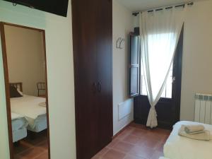 Postel nebo postele na pokoji v ubytování CabraBerry