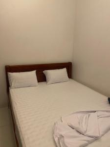 Ein Bett oder Betten in einem Zimmer der Unterkunft Êm Home 3 Phòng Ngủ