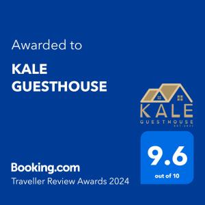 a sign that reads awarded to kale guest house at KALE GUESTHOUSE in Gjirokastër