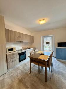 Kuchyň nebo kuchyňský kout v ubytování Loft in Fiera + 4 fotografie