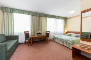 Postel nebo postele na pokoji v ubytování Centrum Zdrowia i Wypoczynku Jantar