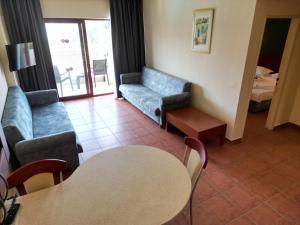 Posezení v ubytování LEMAS SUITE HOTEL