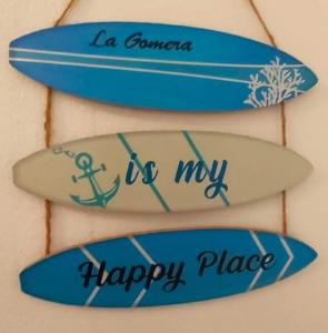 Et logo, certifikat, skilt eller en pris der bliver vist frem på Casa Alicia Studio 2