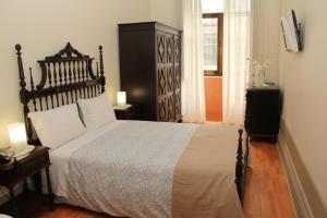 A bed or beds in a room at Guest House 31 de Janeiro (AL)