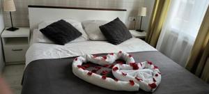 Posteľ alebo postele v izbe v ubytovaní Cracow Central Aparthotel