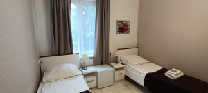 Posteľ alebo postele v izbe v ubytovaní Cracow Central Aparthotel
