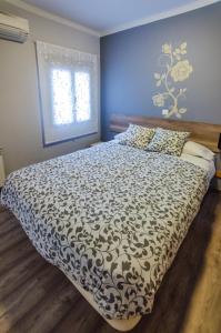Posteľ alebo postele v izbe v ubytovaní Hostal La Pastora