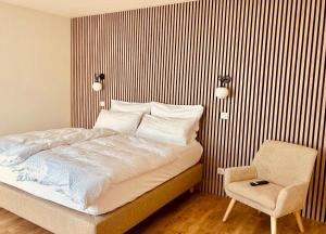 Postel nebo postele na pokoji v ubytování LA CLEF DES SONGES