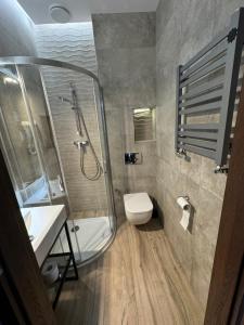 Łazienka w obiekcie Aparthotel Łódź 55 Piotrkowska