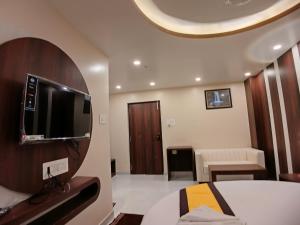 TV a/nebo společenská místnost v ubytování HOTEL RINKY'S PALACE
