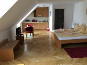 A bed or beds in a room at Gästehaus im Priesterseminar Salzburg