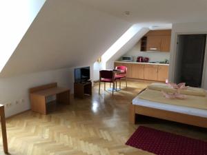 A bed or beds in a room at Gästehaus im Priesterseminar Salzburg