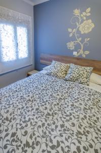 Posteľ alebo postele v izbe v ubytovaní Hostal La Pastora
