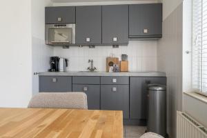 Kuchyň nebo kuchyňský kout v ubytování Hello Zeeland - Vakantiehuis Dunen260
