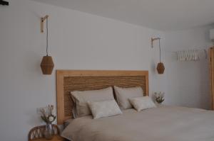 Postel nebo postele na pokoji v ubytování Casa Vive Tu Vida