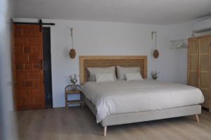 Postel nebo postele na pokoji v ubytování Casa Vive Tu Vida + 23 fotografií