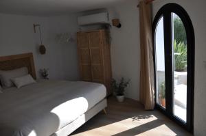 Postel nebo postele na pokoji v ubytování Casa Vive Tu Vida
