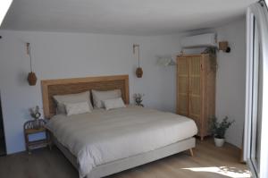 Postel nebo postele na pokoji v ubytování Casa Vive Tu Vida
