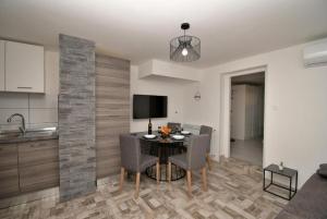 TV a/nebo společenská místnost v ubytování Apartman Fabris